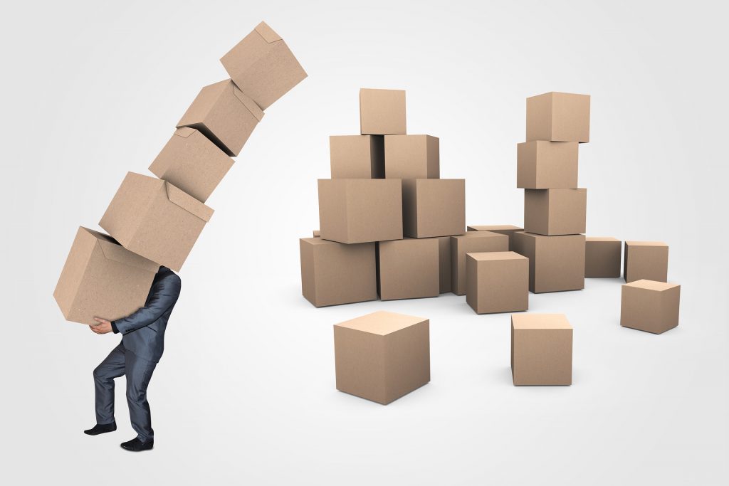 Man carrying cardboard storage boxes