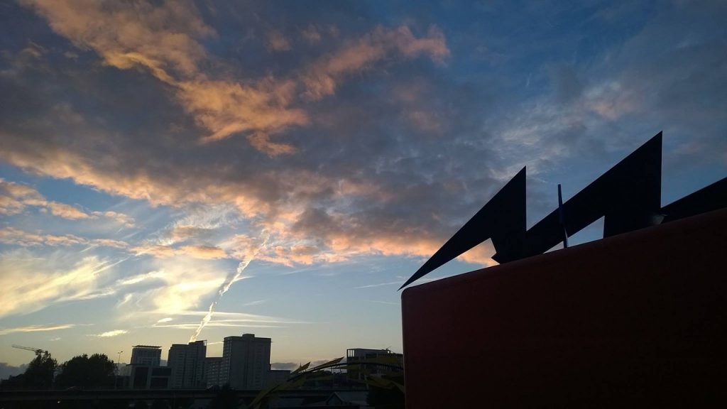 Industrial buildings againgst a sunset in Cardiff city https://www.peakpx.com/sky/3?size=1080p