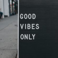 board with text saying good vibes