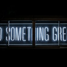 neon sign saying do something great