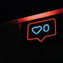 neon symbol of a speech bubble