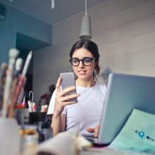 woman looking at her phone