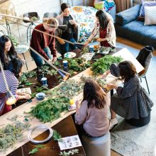 women preparing flowers in a commercial space