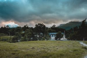 hotel amongst hills and field 