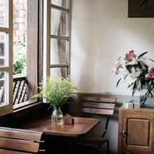 wooden desk by window