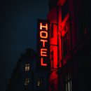 glowing red hotel sign