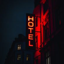 glowing red hotel sign