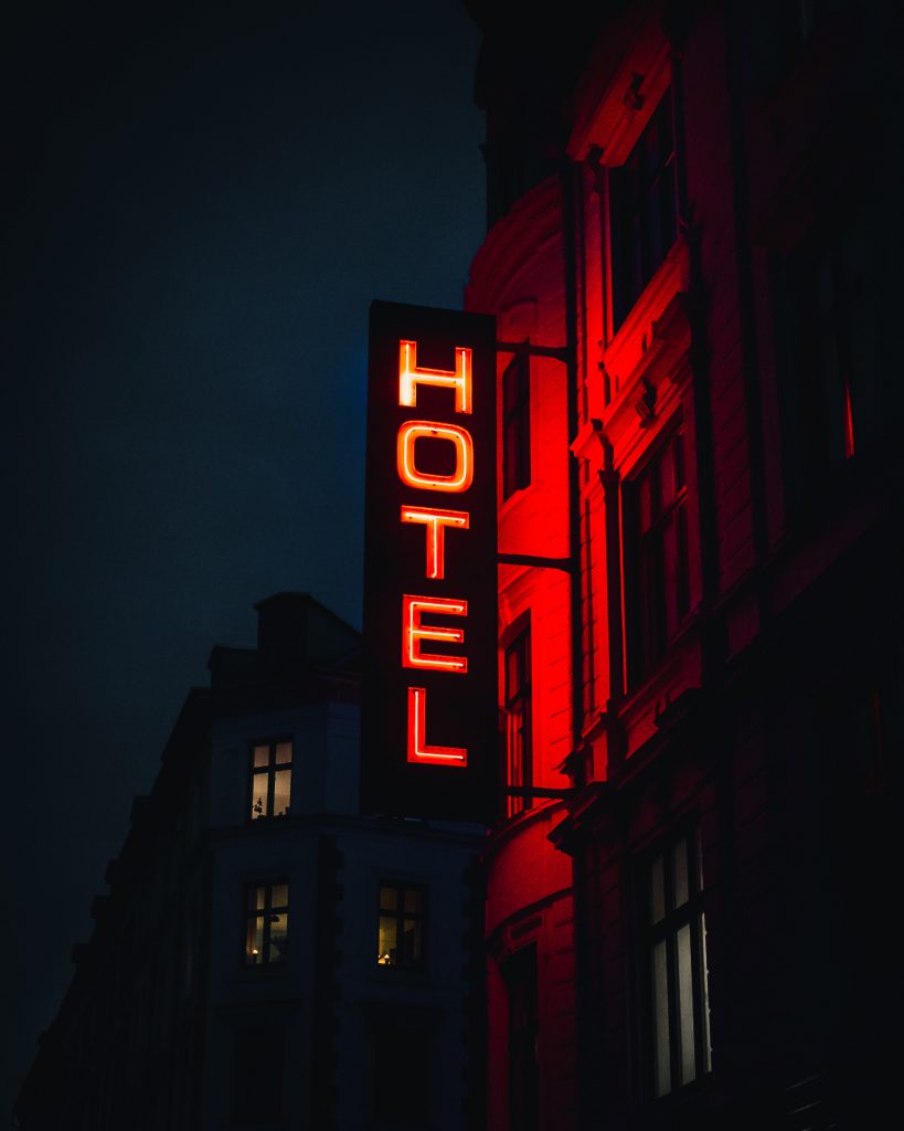 glowing red hotel sign