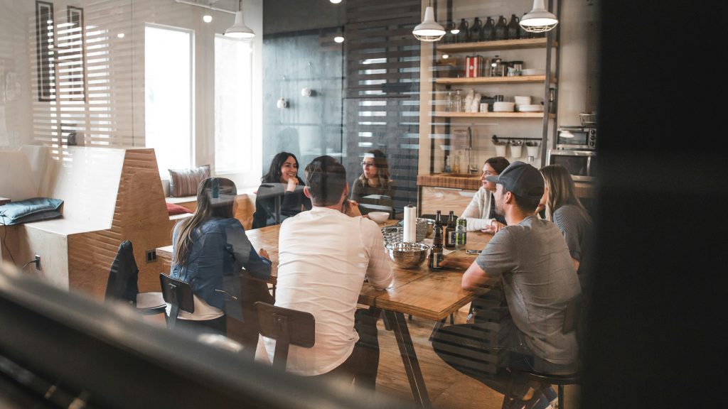 people sat round an office table