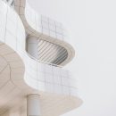 white building with curved balconies