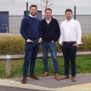 full length photo of three men