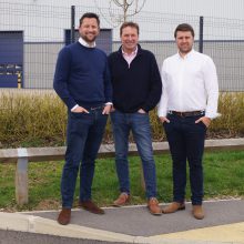 full length photo of three men