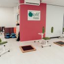 Gym equipment in a white room