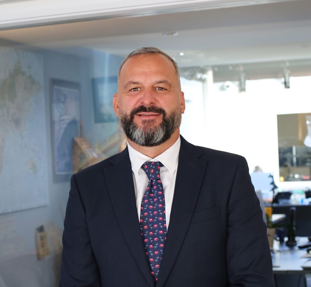 portrait photo of man in a business suit and tie