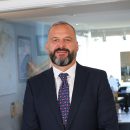 portrait photo of man in a business suit and tie